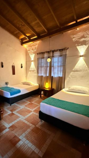 Habitaciones en cabaña junto a bosque, lavadora disponible